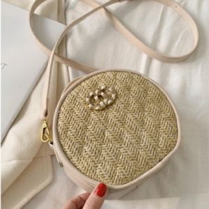 Straw and vegan leather round  crossbody